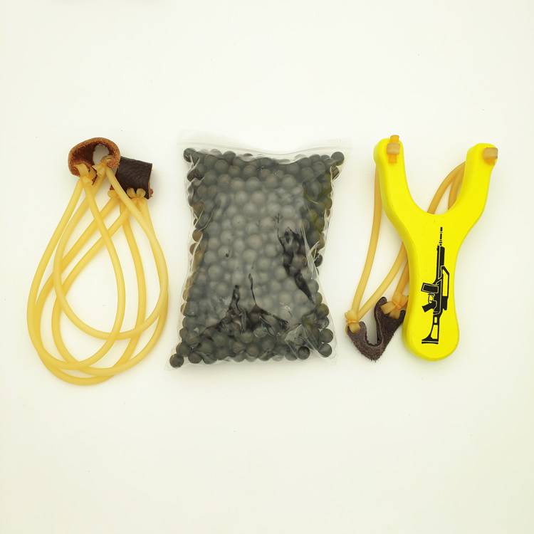 Yellow slingshot + 500 mudballs + 2 skin bands